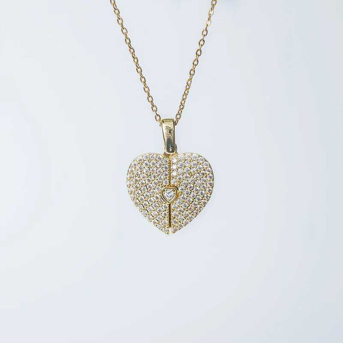 Elegant gold open close heart necklace